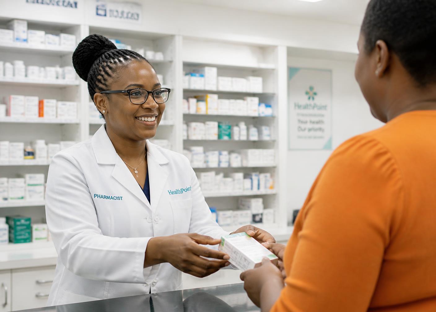Pharmacist dispensing medicine at the hospital pharmacy